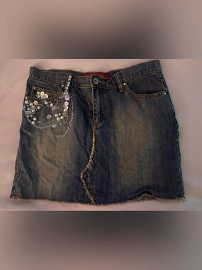 Y2K charm and button embellished skirt